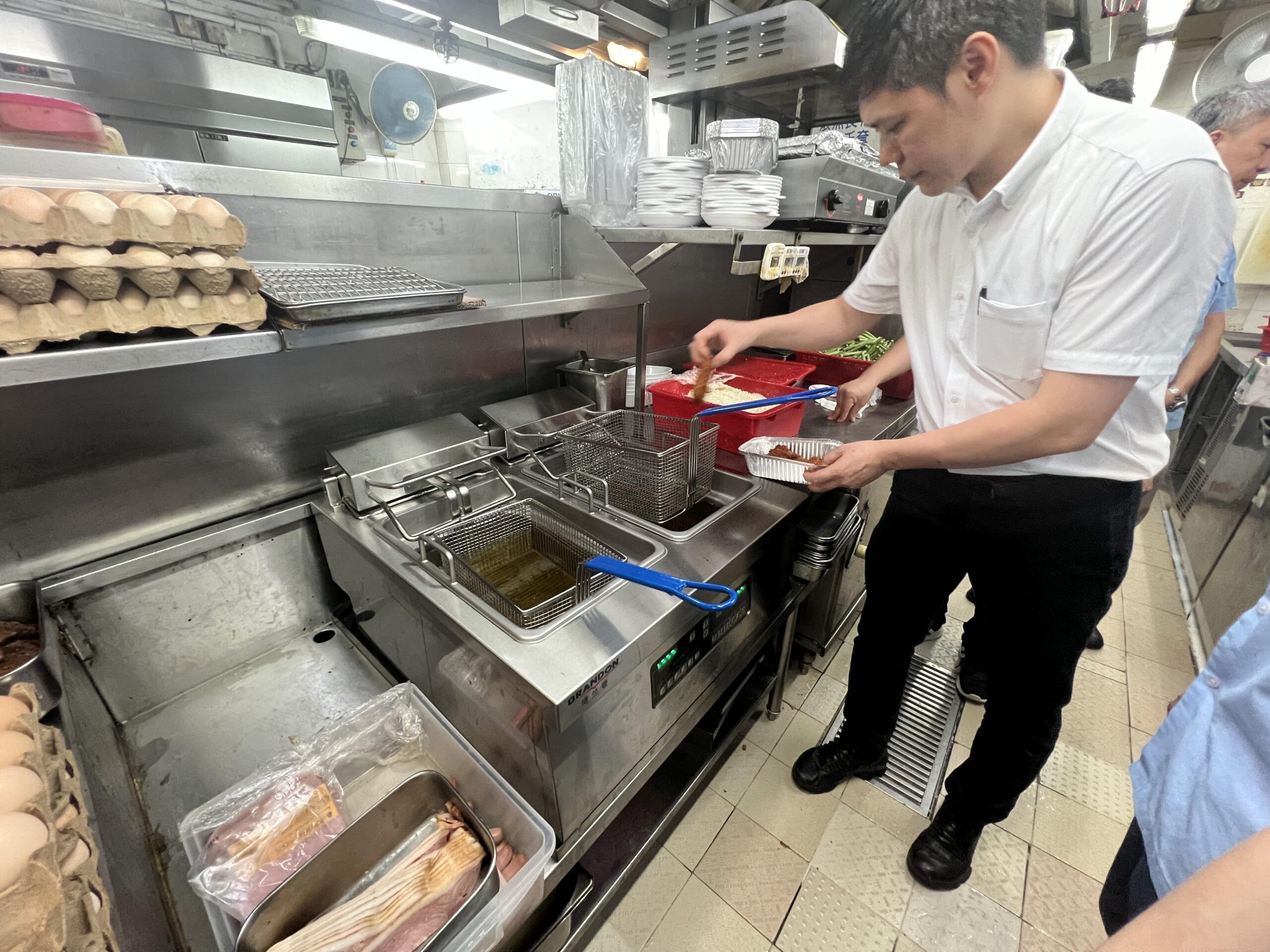 Chef Ma from Maxim trying out fried chicken